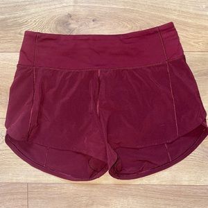 Maroon Lululemon Speed Ups, size 4 4 inch inseam.